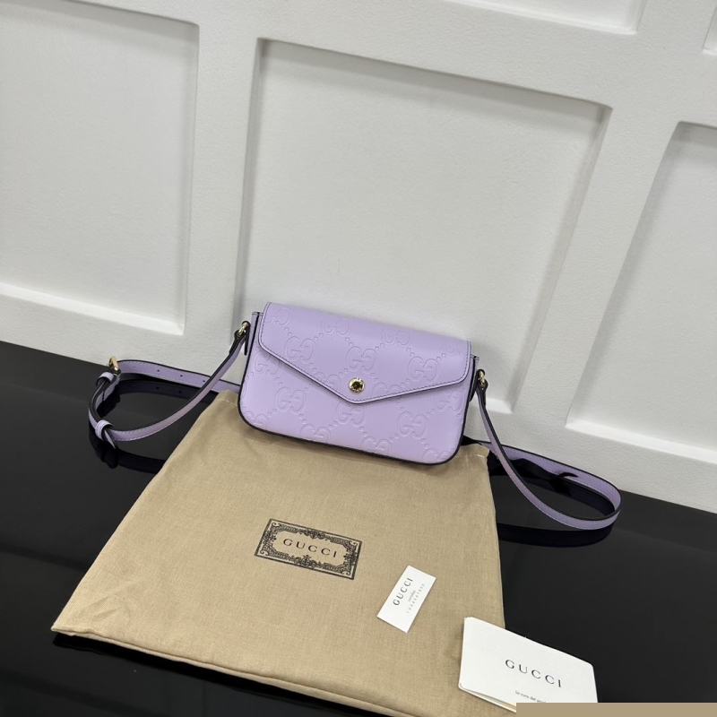 G*u*i satchel bags